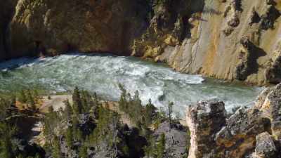 That rock is rich in iron
deposits, which oxidize over time, - Yellowstone: One-Fifty