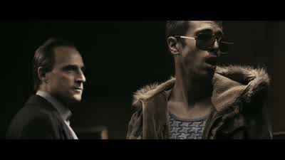 That Roman and Mickey is the famous Archy slap - RocknRolla