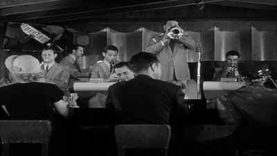 That Teagarden. He sure can
play that horn, can't he? - The Glass Wall