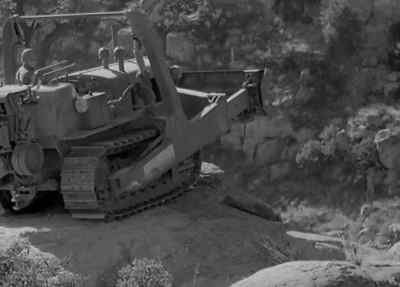 That'll teach 'em to monkey
with construction men. - The Fighting Seabees