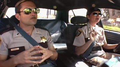 That's funny because smiley reminds me - Reno 911!