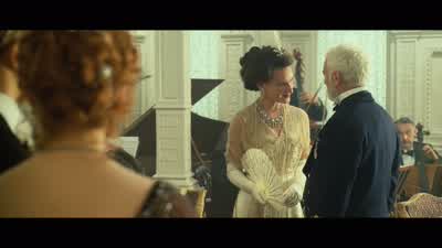 And that's John Jacob Astorthe richest man on the shipHis little wifey there Madeleine is my age and in a delicate conditionSee how she's trying to hide it - Titanic