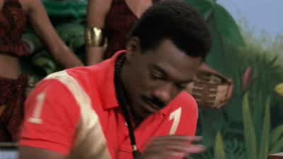 What is he doingIt looks as if he's coming here to talk to us - Coming to America