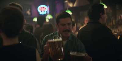 - That's for you.
- [patron 2] All I'm saying is, - The Greatest Beer Run Ever