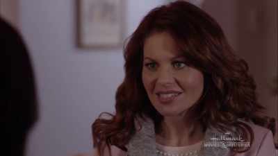 The adoptive parents probably - A Bundle of Trouble: An Aurora Teagarden Mystery