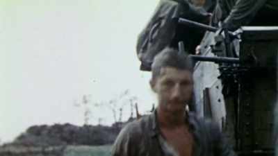 The Americans could only wait
it out in cold, wet misery. - The Pacific War in Color