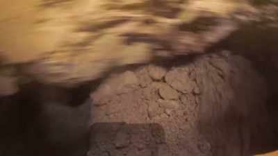 The arm is churning through the dirt - Outback Opal Hunters