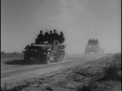 The army convoy moved into the field - Plan 9 from Outer Space