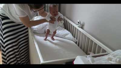 The baby moves its legs alternately, - Babies