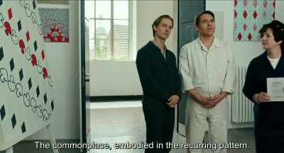The banality,
embodied by the recurring pattern.
. - Never Look Away