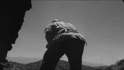 The beast, finding
his victim gone... - The Beast of Yucca Flats