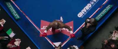 The boxer turned preacher
is down on his knees, - Big George Foreman