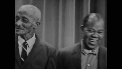 The boys would clap and sing,
and he'd sing and dance. - Louis Armstrong's Black & Blues