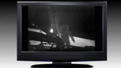 The bright white space suit
he was wearing - American Moon