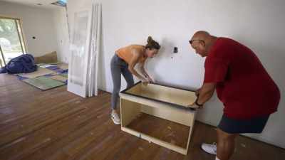 The cabinets are sort of
a light off black - Why the Heck Did I Buy This House?