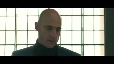The camera's a gun. - Grimsby