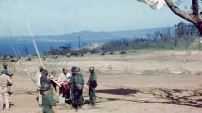 The chutes are still
blowing in the trees. - The Pacific War in Color