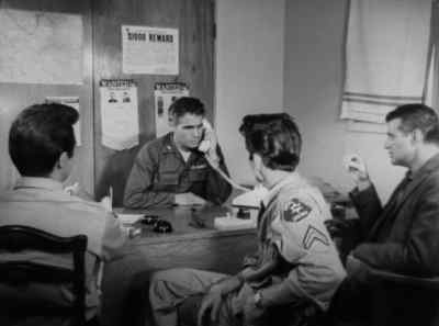 The colonel listened
to Martin's theory, - The Creeping Terror