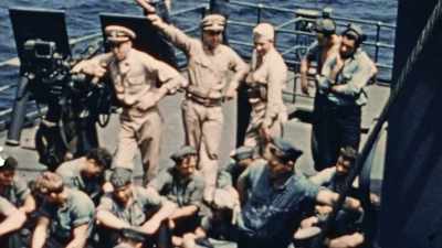 The commanding
officers lay out their prize. - The Pacific War in Color