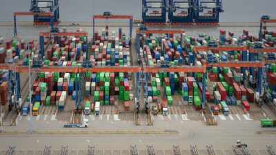 The containers
are then lifted onto lorries, - Europe From Above