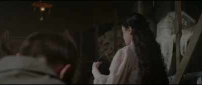 The creepy serpent guy wore
a dramatic full-length wool - Theodosia