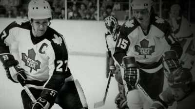 The deep blue letter C
on his chest, - Offside: The Harold Ballard Story