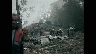 The eight-storey building
collapsed in on itself, - Putin: A Russian Spy Story