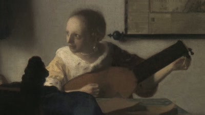 The fabric neatly drapes
around her young shoulders, - Vermeer: The Greatest Exhibition