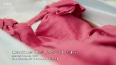 The first is a raspberry pink
cocktail dress with - Secrets of the Museum