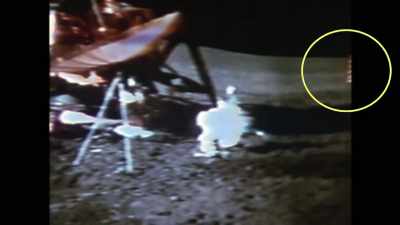 The flag enters the frame
from the right side, then exits, - American Moon