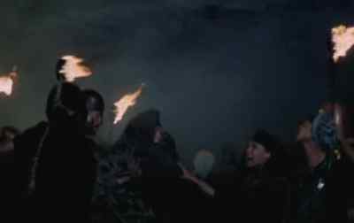 - The flames light up the city.
- The fire devours everything. - The Trojan Women