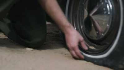 The flat tire
didn't look right to him. - Buried In The Backyard