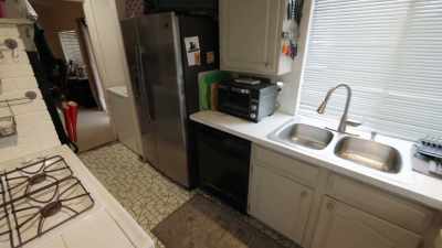 The foyer is bigger
than the kitchen. - Renovation Impossible