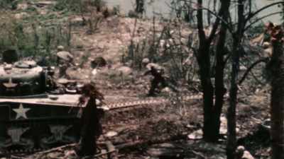 The ground rocked and
swayed from shell concussions. - The Pacific War in Color