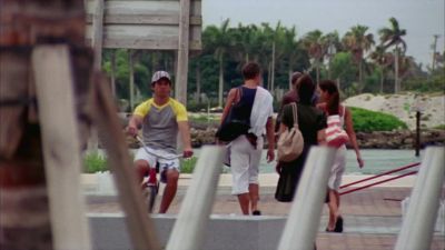 The guy on the bike
just dropped something. - Burn Notice
