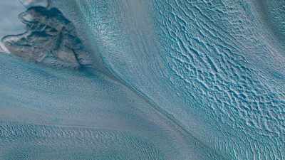 The increased meltwater accelerates
the ice sheet's slide downhill. - Frozen Planet II