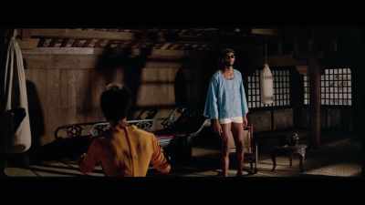 'The jumpsuit's bold colours
are complemented - The Final Game of Death