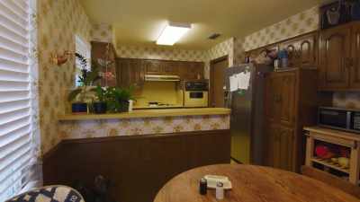 -the kitchen.
-[Paige exclaims] - Renovation Impossible