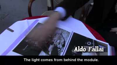The light comes from behind the module, - American Moon