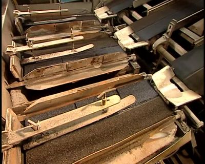 THE MACHINE AUTOMATICALLY STACKS
THE SHINGLES FOR PACKAGING, - How It's Made