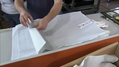 THE MACHINE USES AN EXTREMELY
STRONG OVERLOCK STITCH. - How It's Made