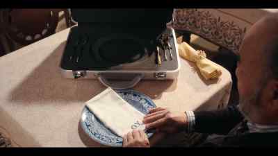 The man brings his own dinnerware
to every meal. - A Man on the Inside