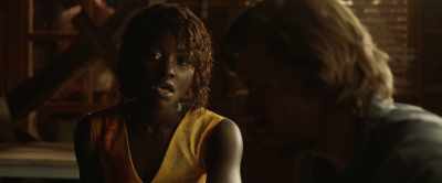 "The man in between
waits between the two, - Little Monsters