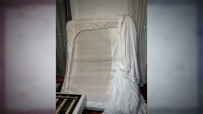 The mattress being pulled 
over Aliza's face - New York Homicide