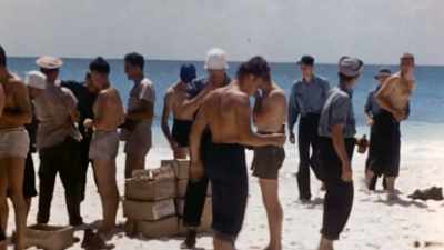 The men celebrate their triumph. - The Pacific War in Color