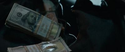 The money is doused in gasoline - Breaking In