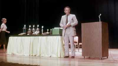 The monsignor will say the benediction. - Graduation Day