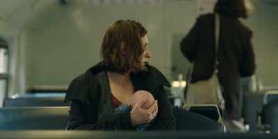 The mother put the child - The Secrets She Keeps