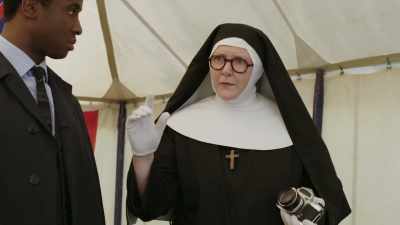 The murderer holds her down, - Sister Boniface Mysteries