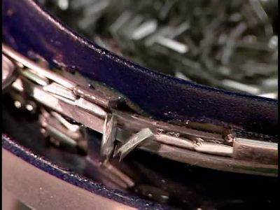 THE NEXT MACHINE
INSTALLS THE SLIDER. - How It's Made